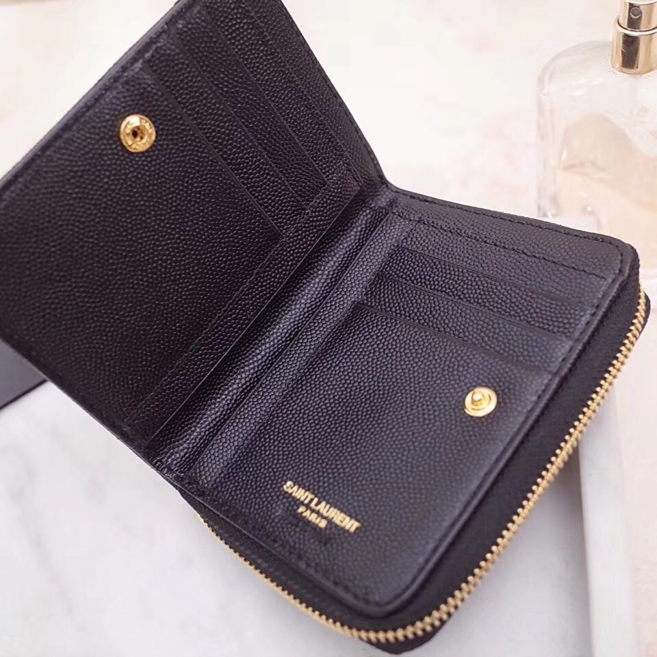 Sa**t Lau*nt compact zip around wallet in black leather