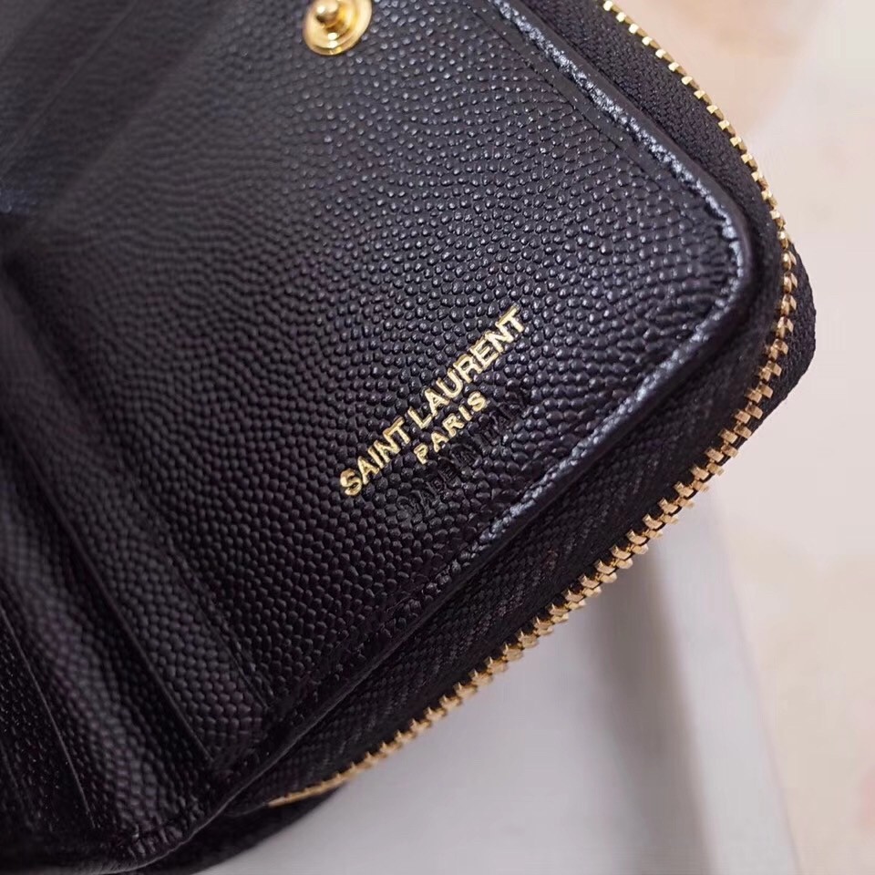 Sa**t Lau*nt compact zip around wallet in black leather