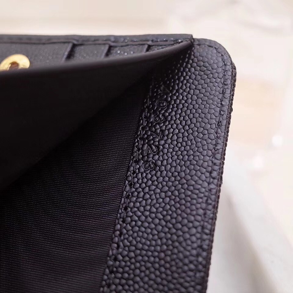 Sa**t Lau*nt compact zip around wallet in black leather