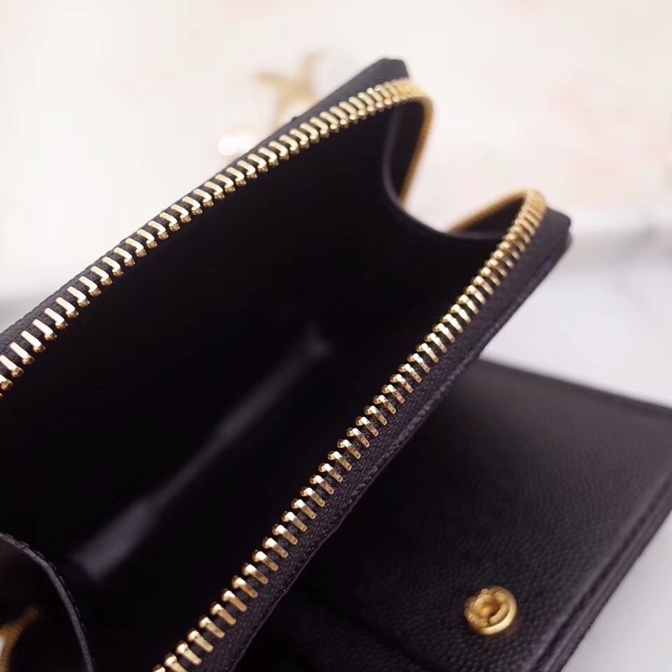 Sa**t Lau*nt compact zip around wallet in black leather