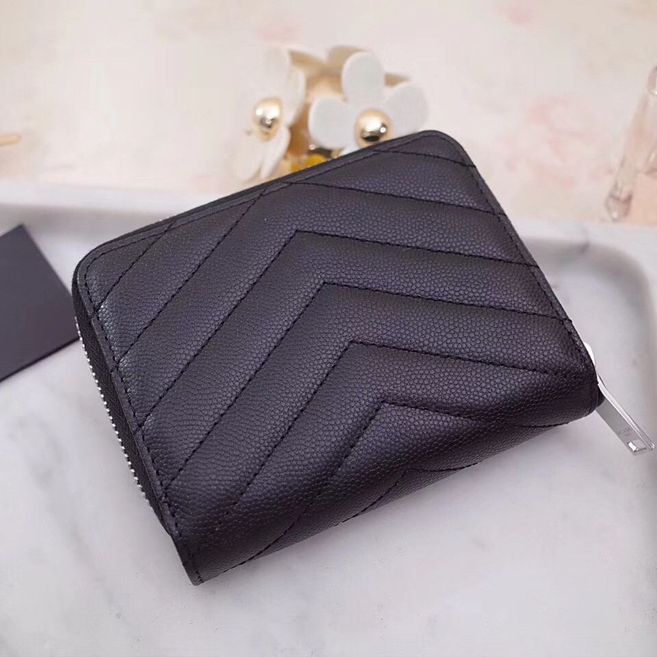 Sa**t Lau*nt compact zip around wallet in noir leather
