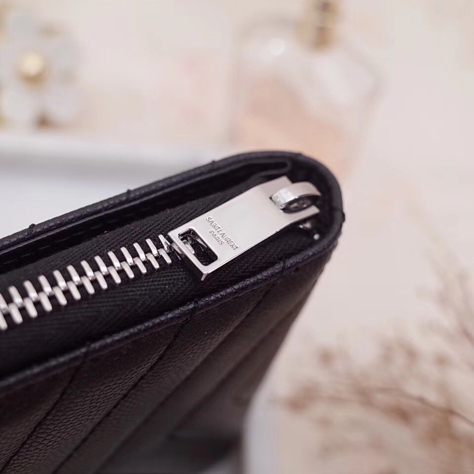 Sa**t Lau*nt compact zip around wallet in noir leather