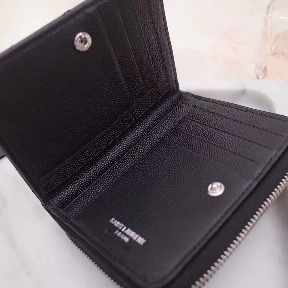Sa**t Lau*nt compact zip around wallet in noir leather
