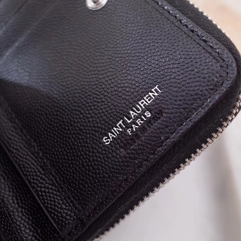 Sa**t Lau*nt compact zip around wallet in noir leather