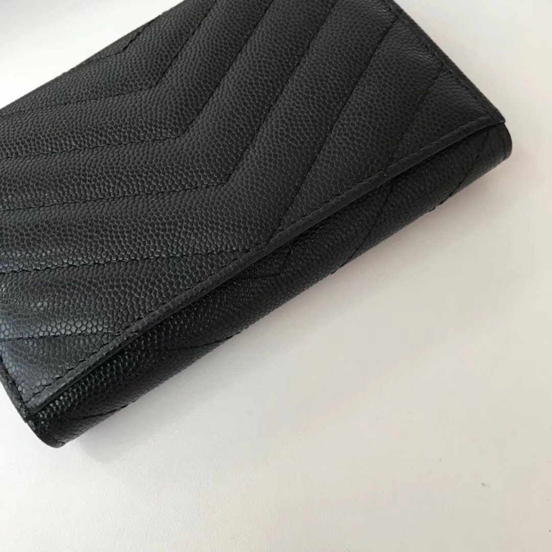 Sa**t Lau*nt small envelope wallet in black leather