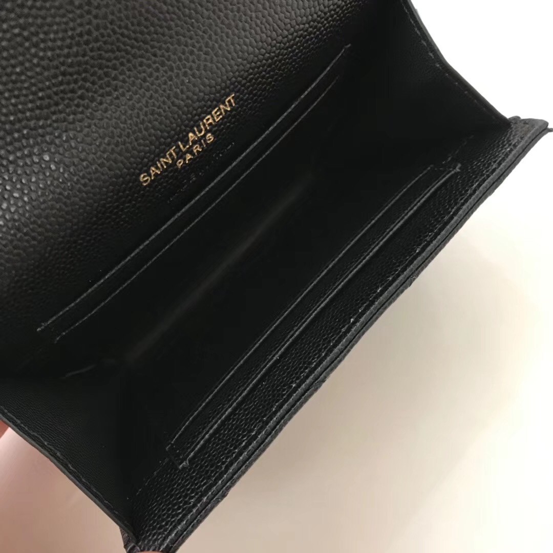 Sa**t Lau*nt small envelope wallet in black leather