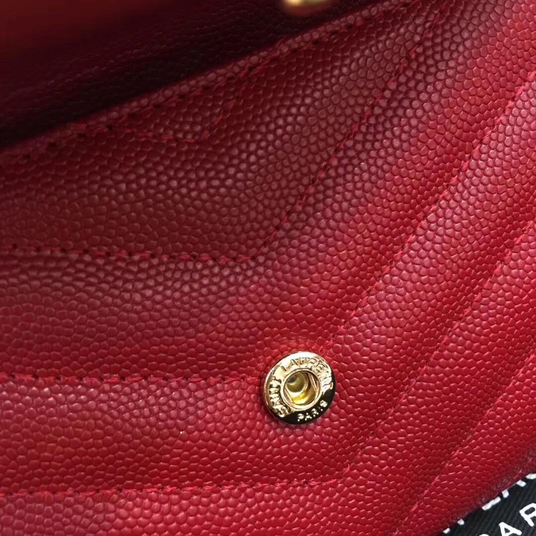 Sa**t Lau*nt small envelope wallet in red leather