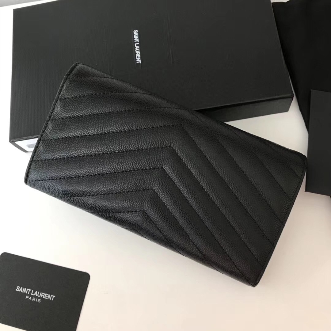 Sa**t Lau*nt large monogram flap wallet in black grained leather