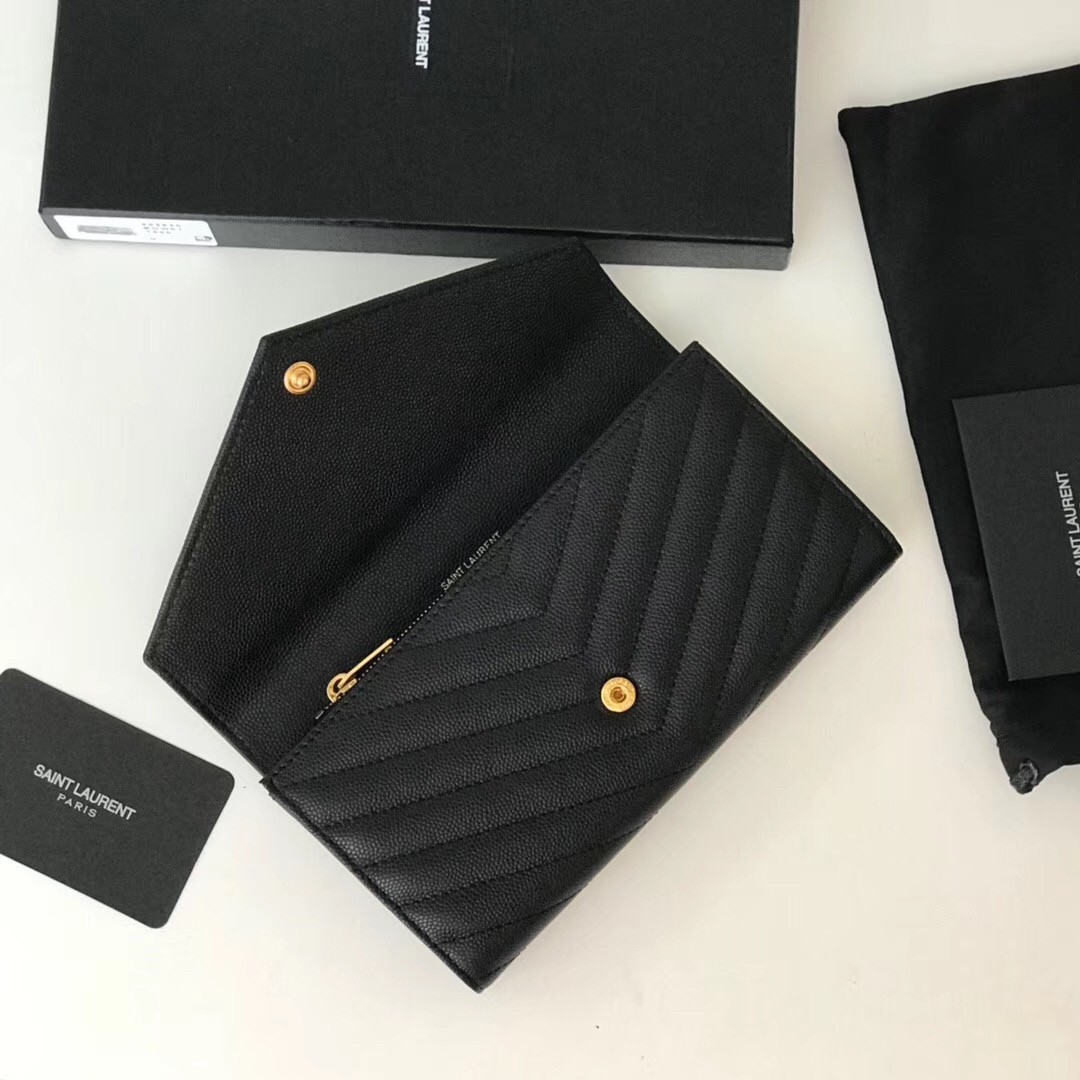 Sa**t Lau*nt large monogram flap wallet in black grained leather