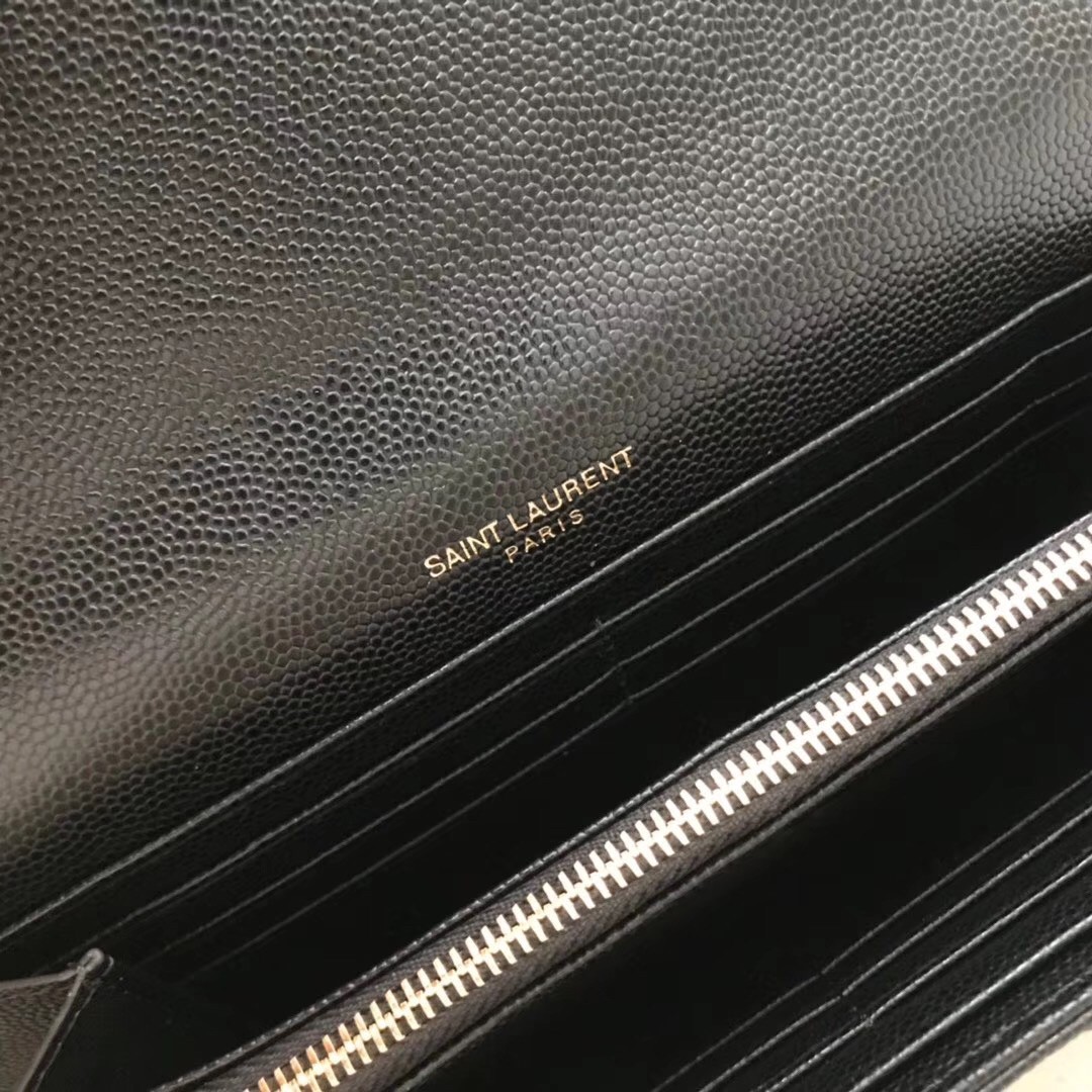Sa**t Lau*nt large monogram flap wallet in black grained leather