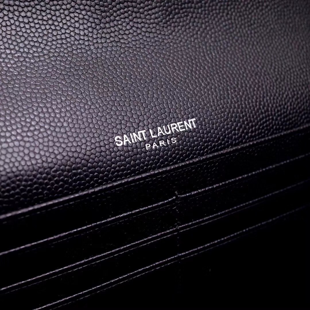 Sa**t Lau*nt large monogram flap all black wallet