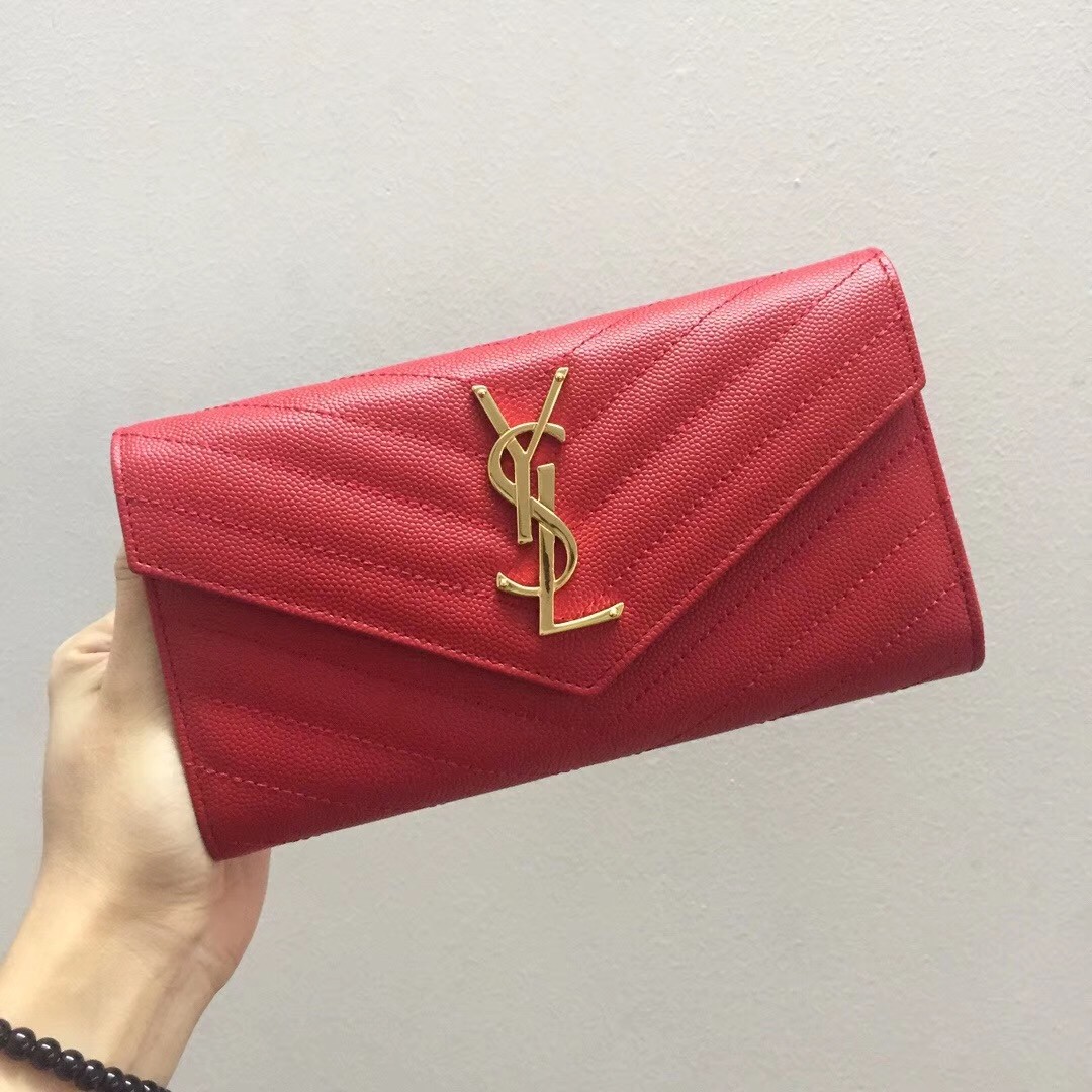 Sa**t Lau*nt large monogram flap wallet in red grained leather