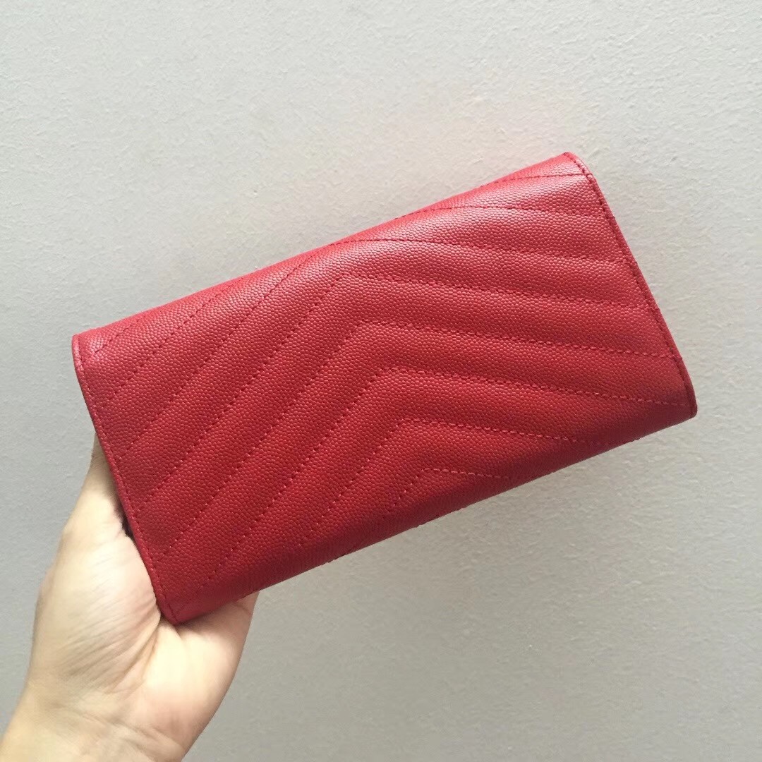 Sa**t Lau*nt large monogram flap wallet in red grained leather