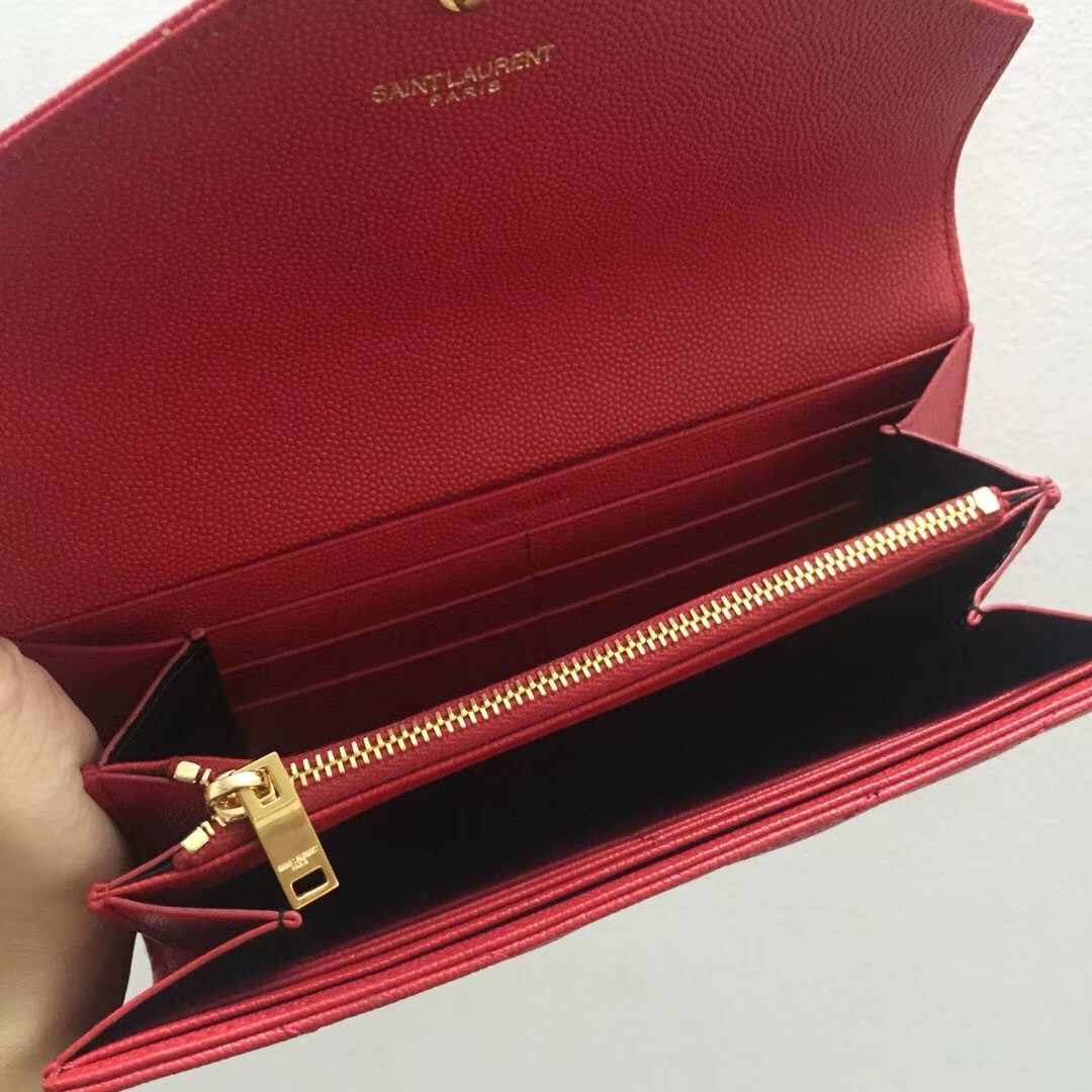 Sa**t Lau*nt large monogram flap wallet in red grained leather