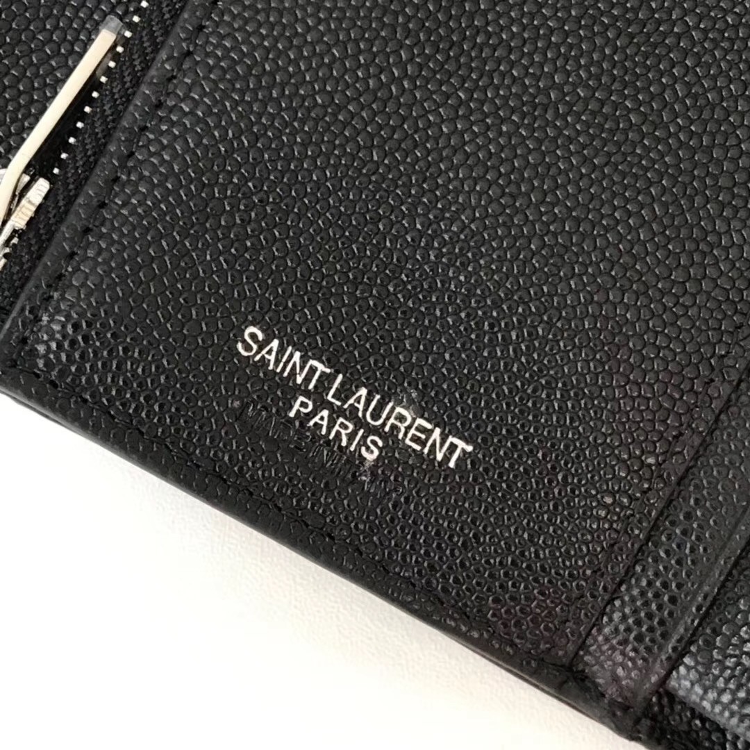 Sa**t Lau*nt compact tri fold wallet in noir leather