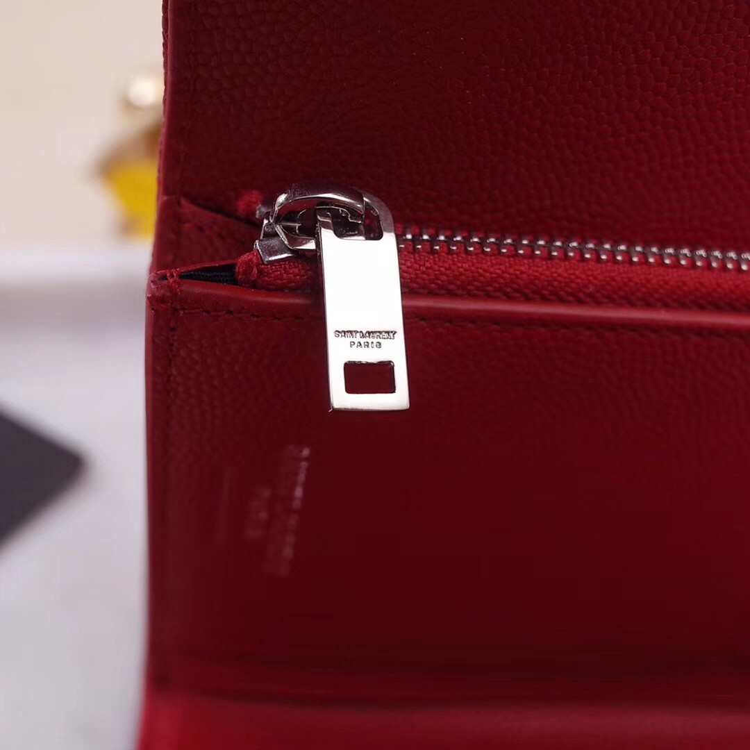 Sa**t Lau*nt compact tri fold wallet in red leather