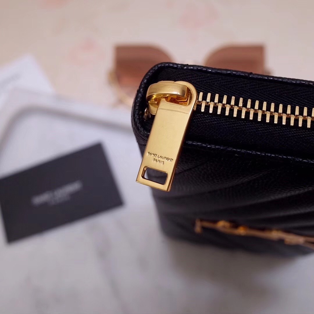 Sa**t Lau*nt monogram zip around wallet in black grained leather