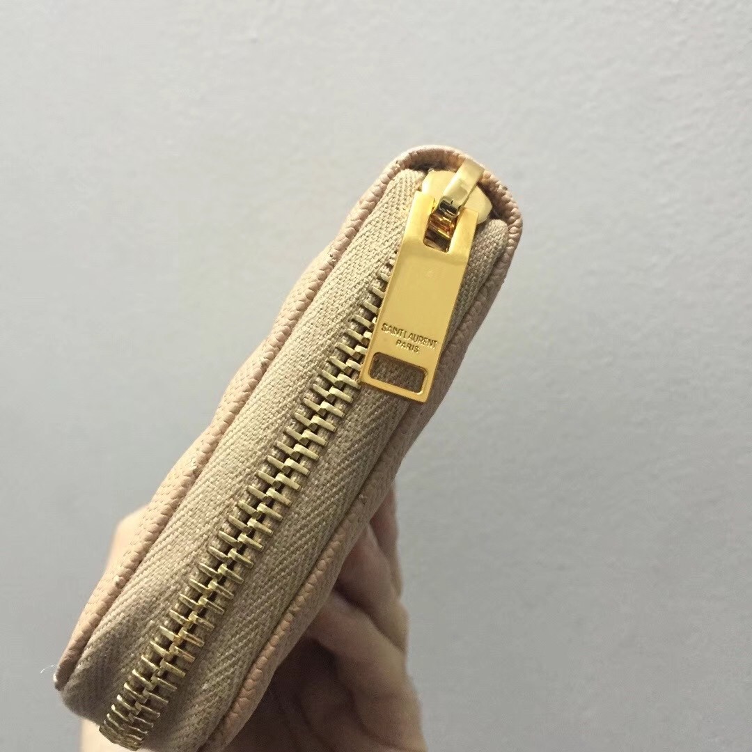 Sa**t Lau*nt monogram zip around wallet in powder grained leather