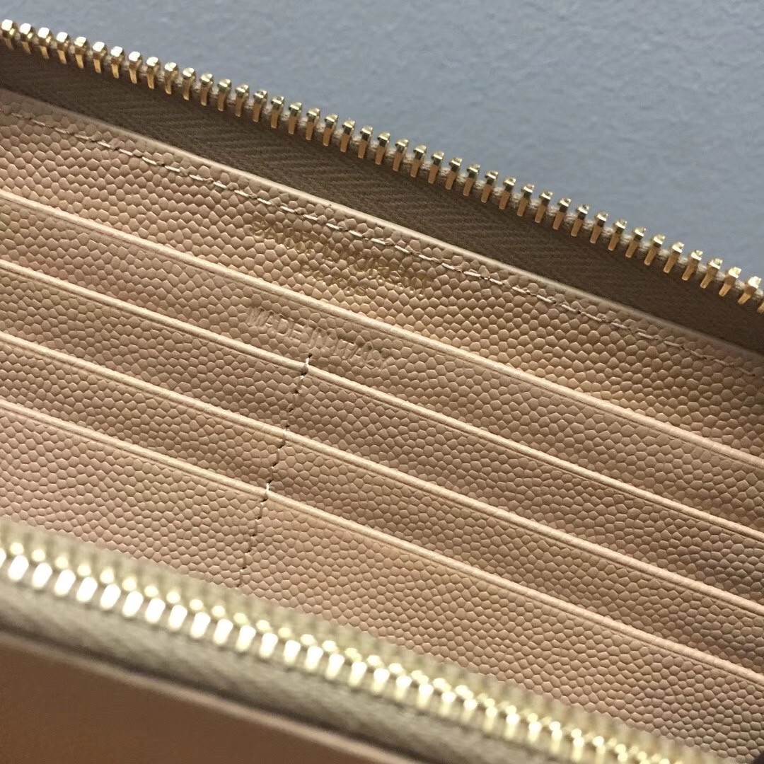 Sa**t Lau*nt monogram zip around wallet in powder grained leather