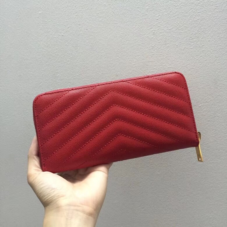 Sa**t Lau*nt monogram zip around wallet in red grained leather