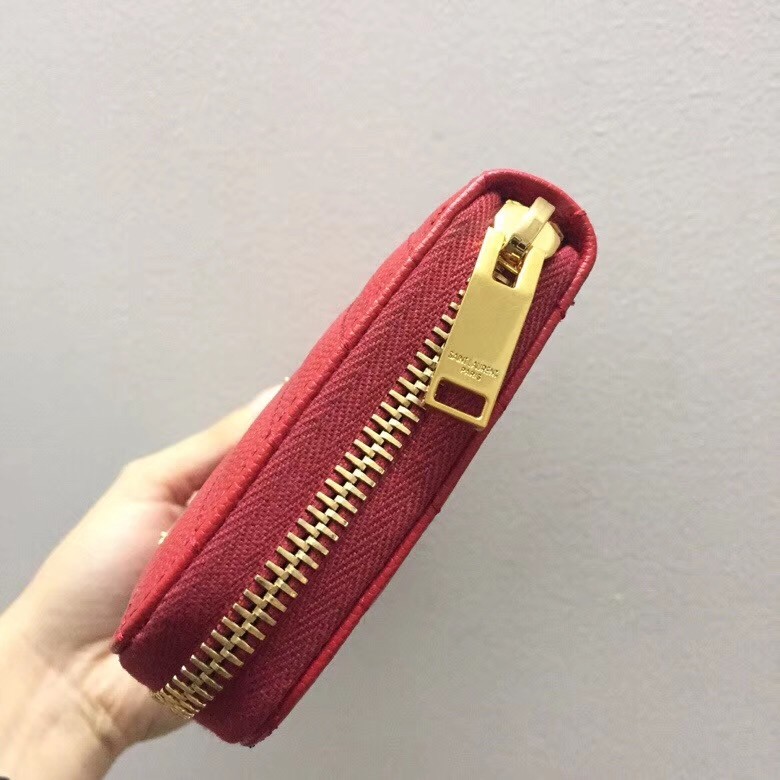 Sa**t Lau*nt monogram zip around wallet in red grained leather