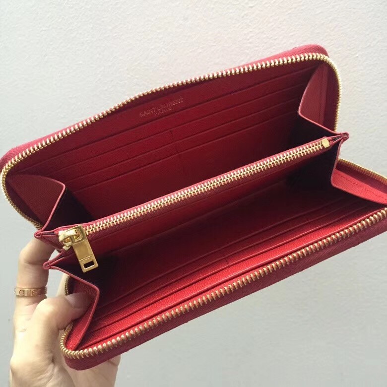 Sa**t Lau*nt monogram zip around wallet in red grained leather