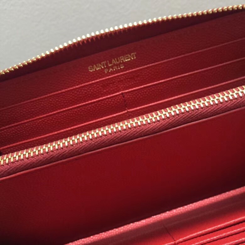 Sa**t Lau*nt monogram zip around wallet in red grained leather